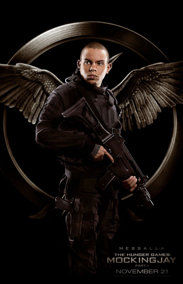 Liam Hemsworth Brings His Sexy Smolder to the Mockingjay—Part 1 Poster
